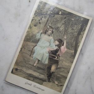 antique French postcard in color ... little boy pushes girl on swing ... postal